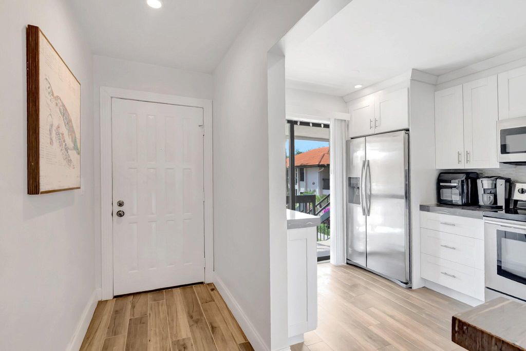 Photo of 301 Club Circle #209, Boca Raton, FL 33487 (MLS # R11129240)