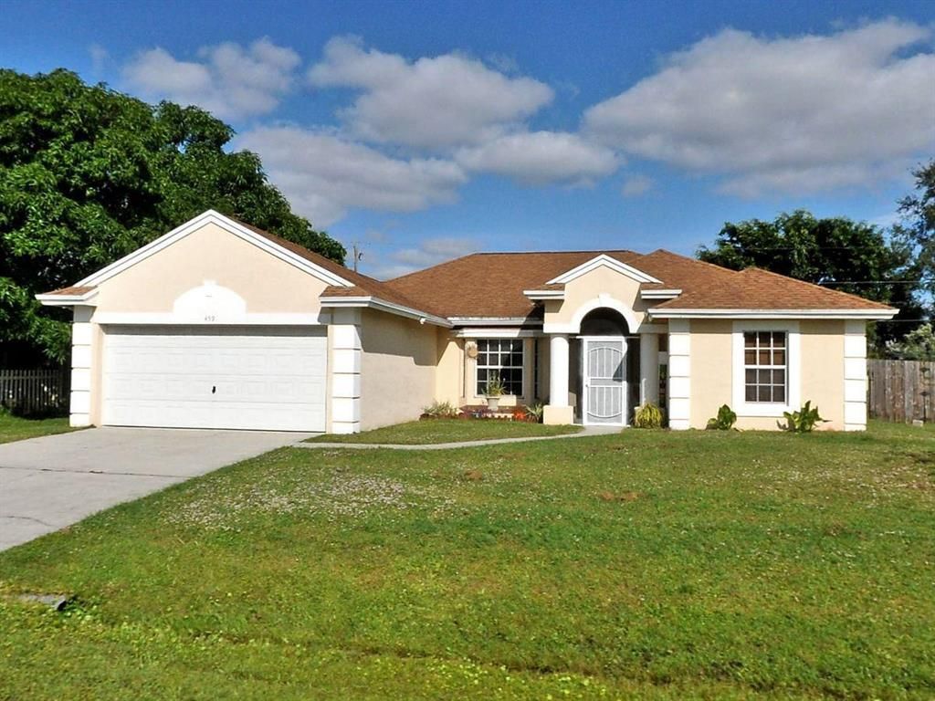 Photo of 459 SW Laconic Avenue, Port Saint Lucie, FL 34953 (MLS # R10775357)