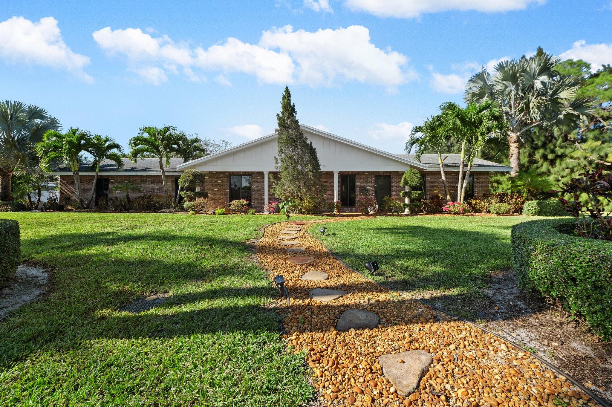 Exquisite country estate in a park like setting backing up to a county park. Oversize pool, patio area. Completely and tastefully remodeled. Rustic fireplace adding to the rustic charm. Single garage, but parking for four or five cars. Attached one bedroom, mother-in-law, suite. Owner resides on property for complete care and maintenance.