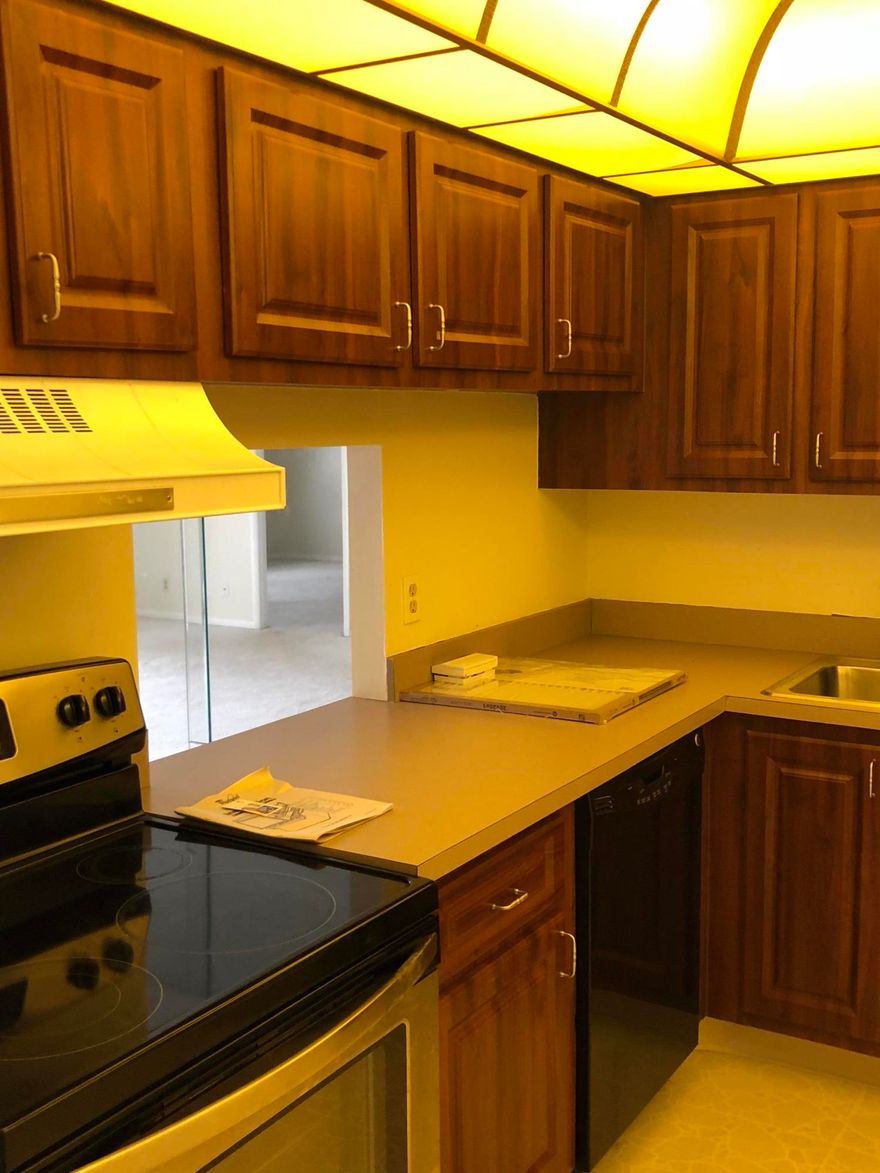 This beautiful gated community offers outstanding living at a great price. This two bedroom, two bathroom condo is a must see!! Balcony overlooking the complex. Includes pool, tennis courts, and clubhouse with gym. Owner has replaced carpet with new floors. Minutes from downtown West Palm Beach and the outlet mall. This is not only a lovely place to live, it is safe, fantastic location, great neighborhood and incredible value.