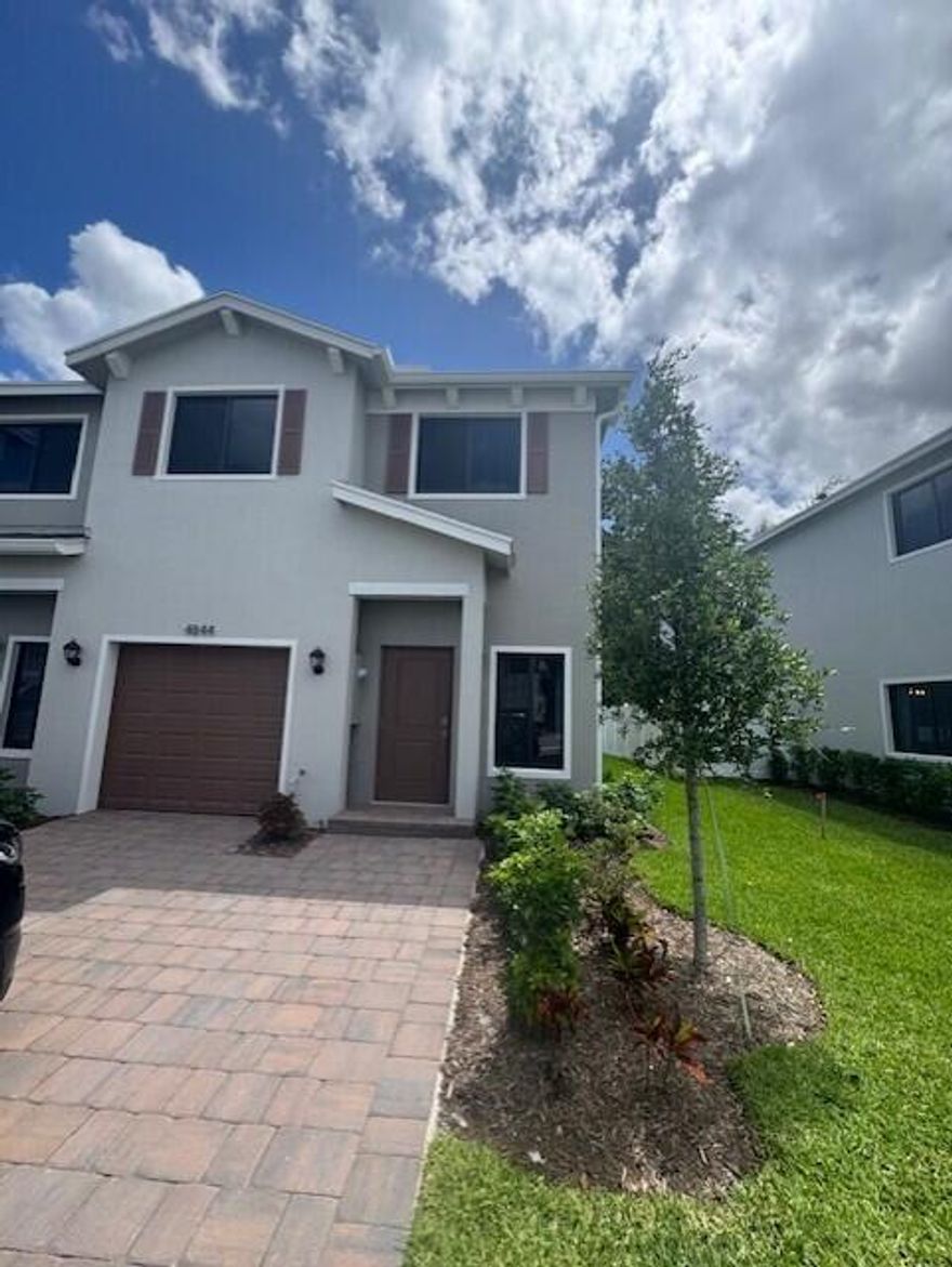 Be The FIRST One to live in this beautiful CORNER LOT 4/2,5 with garage townhome with a spacious backyard. Centrally located , close to major highways, shopping and the beach