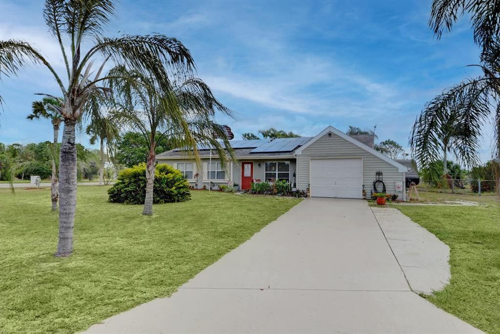 Photo of 2001 SE Hideaway Circle Circle Cir, Port St Lucie, FL 34952 (MLS # R10717172)