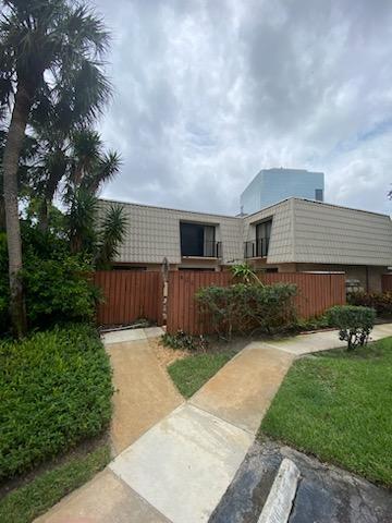 This spacious 2 bedroom, 2.5 bathroom renovated and completely furnished townhome located in gated community of Embassy Park. Conveniently location within minutes of everything...restaurants, shops, airport, entertainment, transportation, medical and beaches. It has a fenced courtyard allowing lots of natural light, bringing the outdoors in. Kitchen, dining area, half bath, living area on the lower level. 2 Bedrooms each with its own full bath on the upper level. Main bedroom has 2 large walk-in closets, tub/shower combo and dual sinks in bath. Balconies off both bedrooms. Whatever your needs are, this home has it all. Rental includes electric.cable ,water and internet.