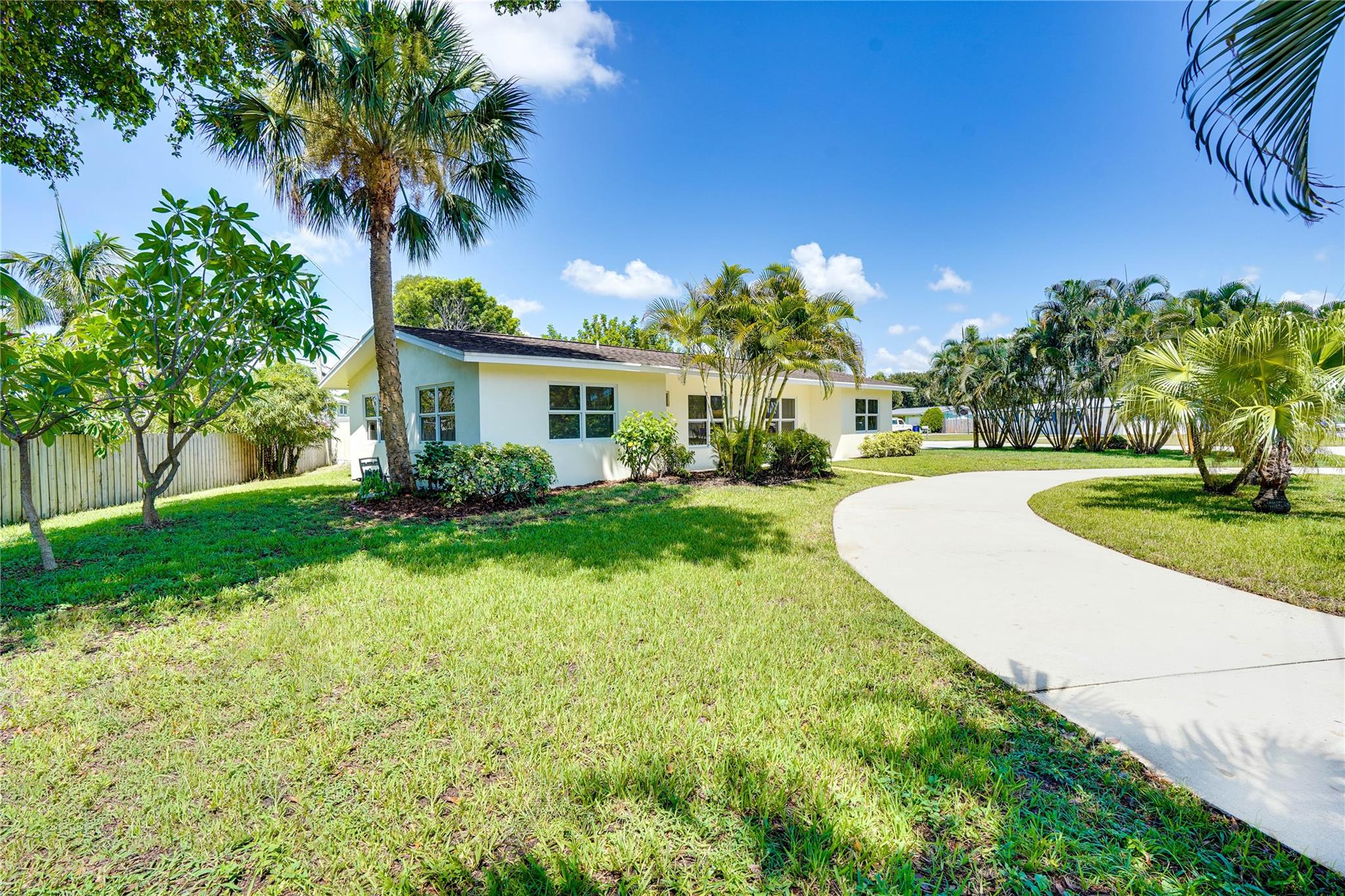 Beautiful four bedroom, 2 bath pool home in North Stuart. Offers tranquility and easy access to popular shops and eateries with plenty of amenities including A rated schools. This spacious property sits on a quiet corner lot and features a separate two car garage with hurricane rated doors and electric door opener and work shop in back. The gunite pool with Cool deck and new privacy fence is perfect for your outdoor entertainment needs. Double driveway offers more than enough room for your RV or boat and there is no HOA and no restrictions. The house features terrazzo floors through out and hurricane rated impact windows. There are also new appliances in the kitchen that carry a 3 year service contact. Come see for yourself this classic Florida home.