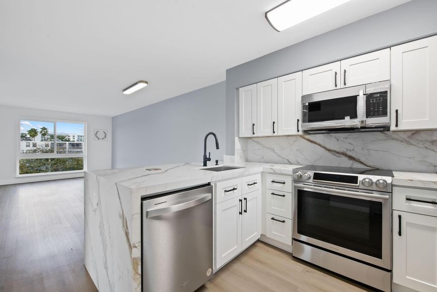 Top-floor, renovated 2-bedroom, 2-bath corner unit with serene lake views. This move-in-ready condo features hurricane impact windows and an in-unit washer and dryer for added convenience. Enjoy peaceful lake views from every room, creating a calm and relaxing atmosphere throughout the condo. The low HOA community offers an impressive array of amenities, including two swimming pools, three tennis courts, a playground, clubhouse, and fitness center. Ideally located near the casino, shopping, dining, and entertainment, with easy access to major highways and just a few miles from the beach. This property offers the perfect combination of lifestyle and location.