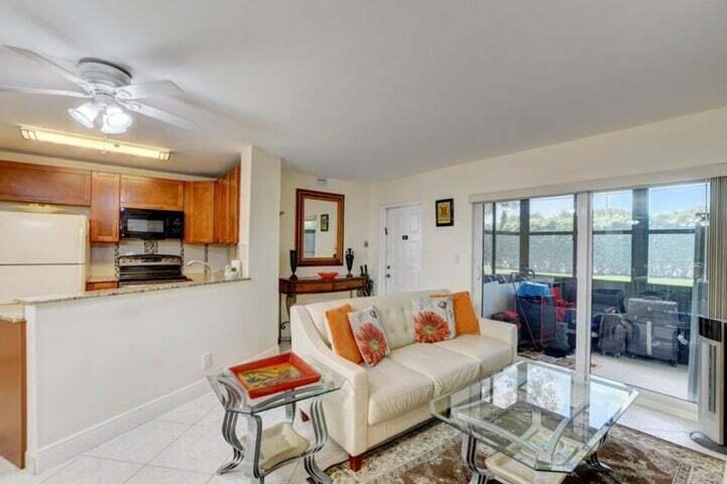 Photo of 7539 S Oriole Boulevard #103, Delray Beach, FL 33446 (MLS # R11149473)