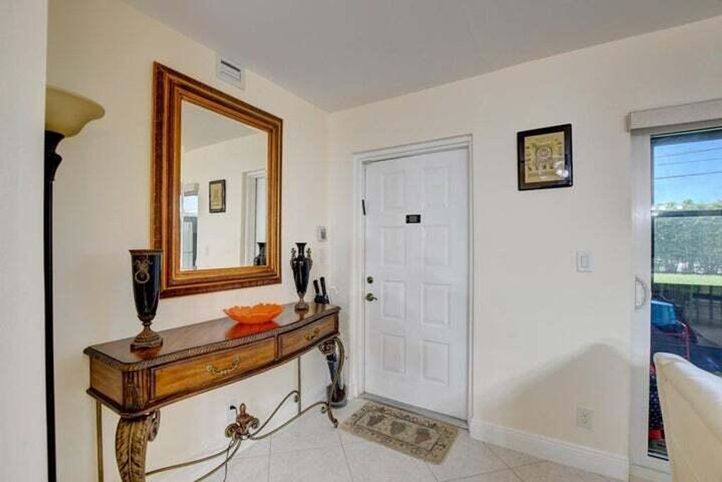 Photo of 7539 S Oriole Boulevard #103, Delray Beach, FL 33446 (MLS # R11149473)
