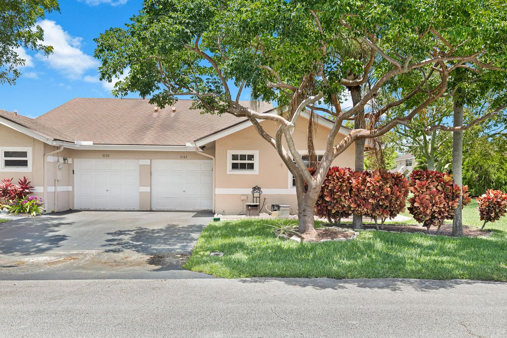 Photo of 5143 NW 12th Lane, Deerfield Beach, FL 33442 (MLS # R11108158)