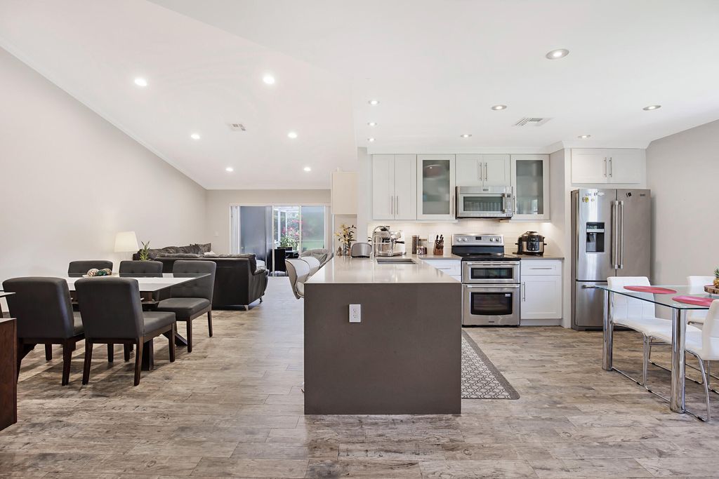 Photo of 5143 NW 12th Lane, Deerfield Beach, FL 33442 (MLS # R11108158)