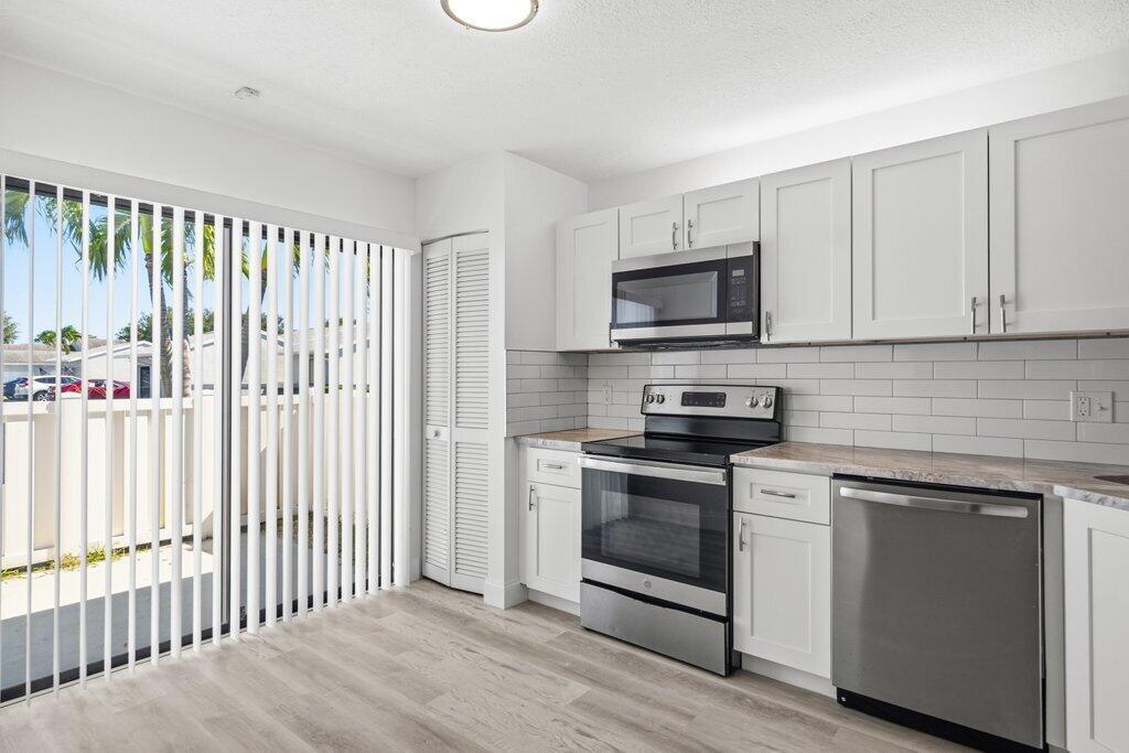 ARBOURS II OF THE PALM BE - Residential