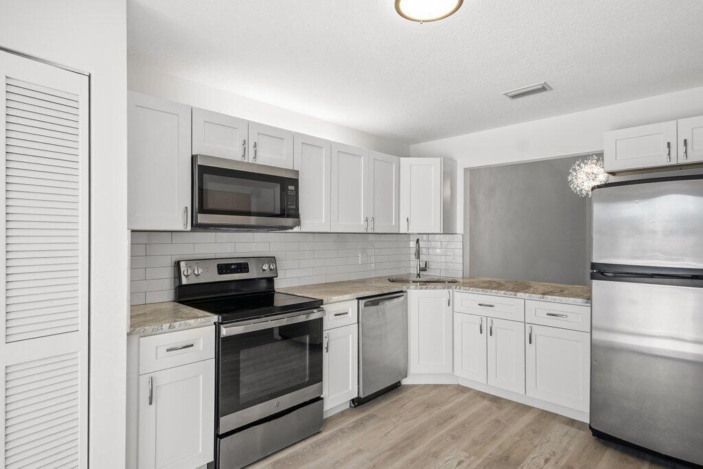 ARBOURS II OF THE PALM BE - Residential