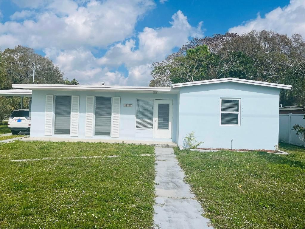 Photo of 213 NE Prima Vista Boulevard, Port Saint Lucie, FL 34983 (MLS # R10958412)