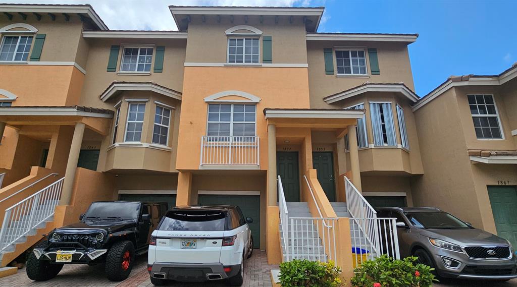 This is a newly remodeled and spacious tri-level townhouse with 3 bedrooms and 3 bathrooms, spanning 1600 sq ft and featuring a garage. It is located in the heart of Boynton Beach within a secure gated community known as The Preserve. The property features an open-floor plan with plenty of natural light throughout the home. The kitchen is open and inviting, with an eat-in area, ample counter space, and a breakfast bar. All countertops have been upgraded to a stunning granite finish. The ground floor guest room includes a full bathroom for privacy and comfort, with direct access to the backyard and patio area. The other two bedrooms are located on the top floor, with the master suite featuring a Roman tub and separate shower, and bedroom 2 including a bathroom with a tub. The garage houses