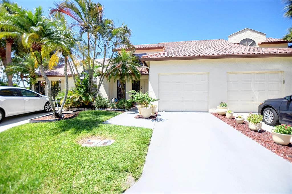 Photo of 18552 Woodstream Drive, Boca Raton, FL 33498 (MLS # R10732855)