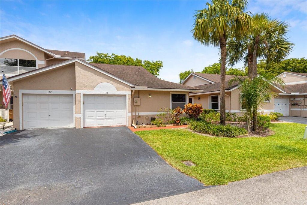 Photo of 1133 W Lakes Drive, Deerfield Beach, FL 33442 (MLS # R10980995)