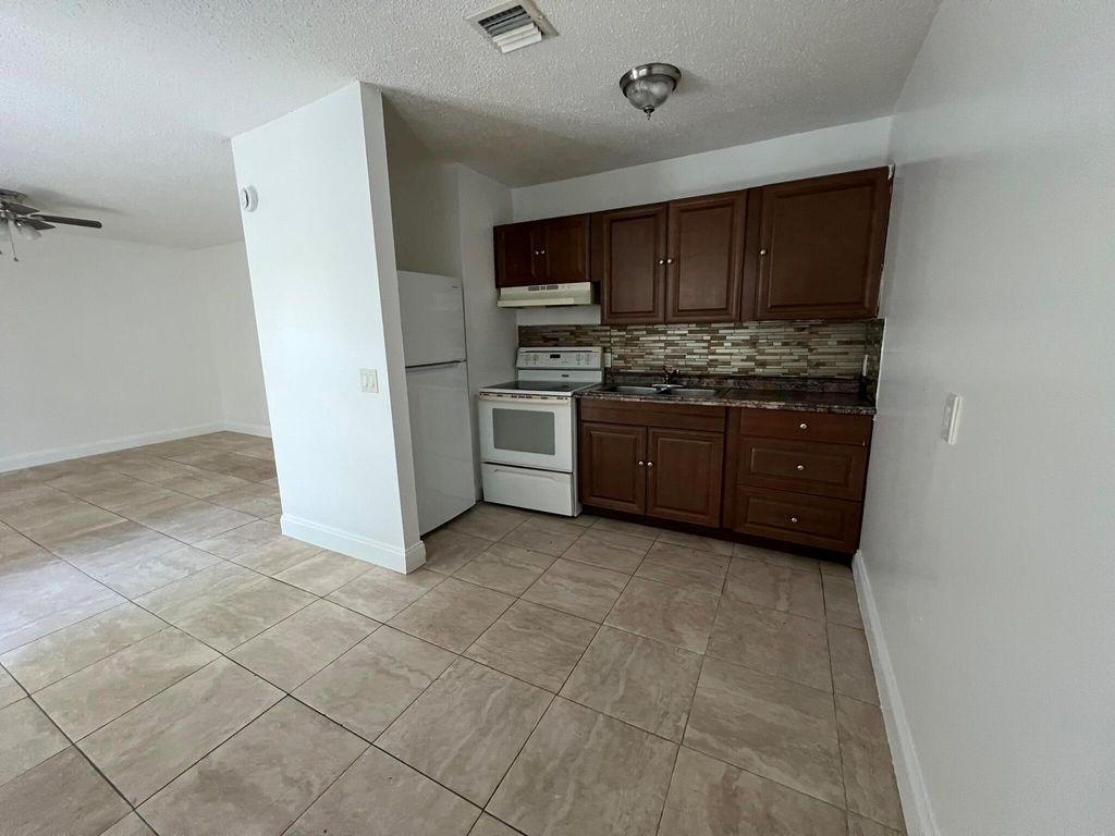 Photo of 1130 N F Street #C, Lake Worth Beach, FL 33460 (MLS # R11061171)