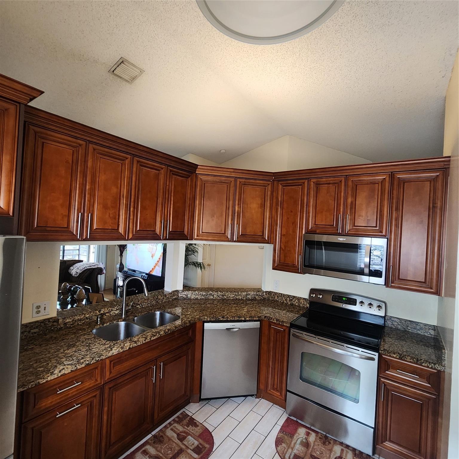 Spacious 3 bedrooms 2 bathrooms 1 car garage condo in the desirable neighborhood of Dos Lagos. Beautiful kitchen with stainless steel appliances, laundry room upstairs with full size washer and dryer. Laminated flooring no carpets. Cable and internet included in rent. Community pool and tennis court, close to shopping mall , restaurants beaches and I95. 1st and security easy rental. Vacant on a lockbox