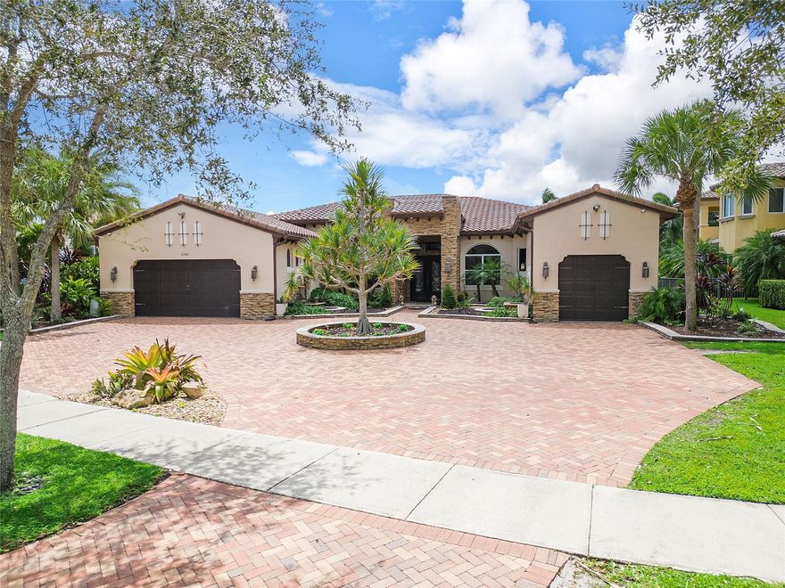 Great Opportunity for this Premium Waterfront Location within the Estates of Heron Bay! This Estate home Boasts Soaring Ceiling Heights and the most desirable Triple-Split floor plan. Offering 6 bed/1 Den, & 5.5 baths, Custom Finishes with Wolf and Sub Zero Appliances, marble floors both in interior/exterior, stone/woodwork, Impact windows! Generous living spaces carry through to the Owner's suite offering a tranquil retreat, complete with a spa-like bathroom, his/her walk-in closets, sitting area. Florida Outdoor living awaits from this oversized private resort style backyard w/ Large Pool, Extended Patio and Summer Kitchen over looking beautiful water views. The Heron Bay community itself is a premier gated community within parkland with world class amenities. Top Notch Parks & Schools!