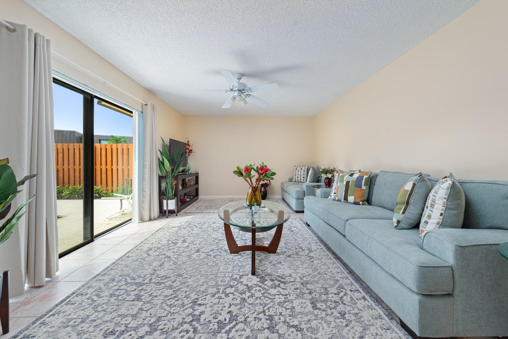 Photo of 5793 SE WINDSONG Lane, Stuart, FL 34997 (MLS # B26078801)