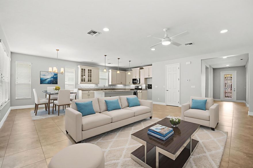 Vitalia at Tradition 55+ Gated Community. Welcome to this beautifully maintained 1-story home in the desirable Vitalia at Tradition, a gated 55+ community. Featuring 3 bedrooms and 2 bathrooms across 2,012 sqft of living space, this home offers comfort and convenience in every corner.

Step into the foyer leading to a bright, open layout. The kitchen boasts a center island, appliances, and ample cabinets for storage, perfect for cooking and entertaining. Adjacent is the laundry room, complete with a washer, dryer, and utility tub. Enjoy Florida living on the screened porch and closed/screened patio, overlooking a fenced backyard ideal for privacy and outdoor activities. The home also includes aluminum Bahama hurricane shutters on the front windows for peace of mind and a spacious 2-car attached garage.

This home is ready for you to move in and enjoy all that Vitalia at Tradition has to offer!