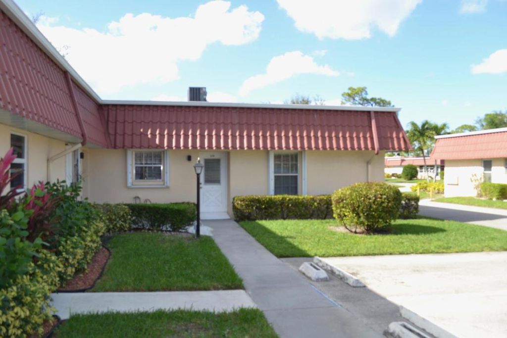 Photo of 570 Laconia Circle, Lake Worth, FL 33467 (MLS # R11130113)