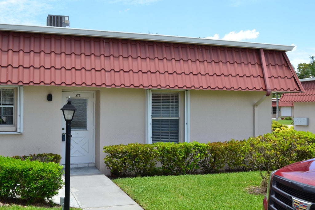 Photo of 570 Laconia Circle, Lake Worth, FL 33467 (MLS # R11130113)