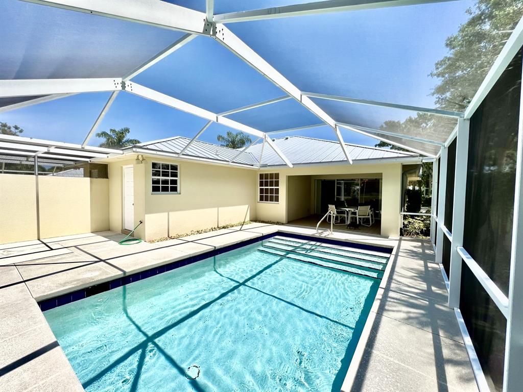 Photo of 1828 SW Waterfall Boulevard, Palm City, FL 34990 (MLS # R10882096)