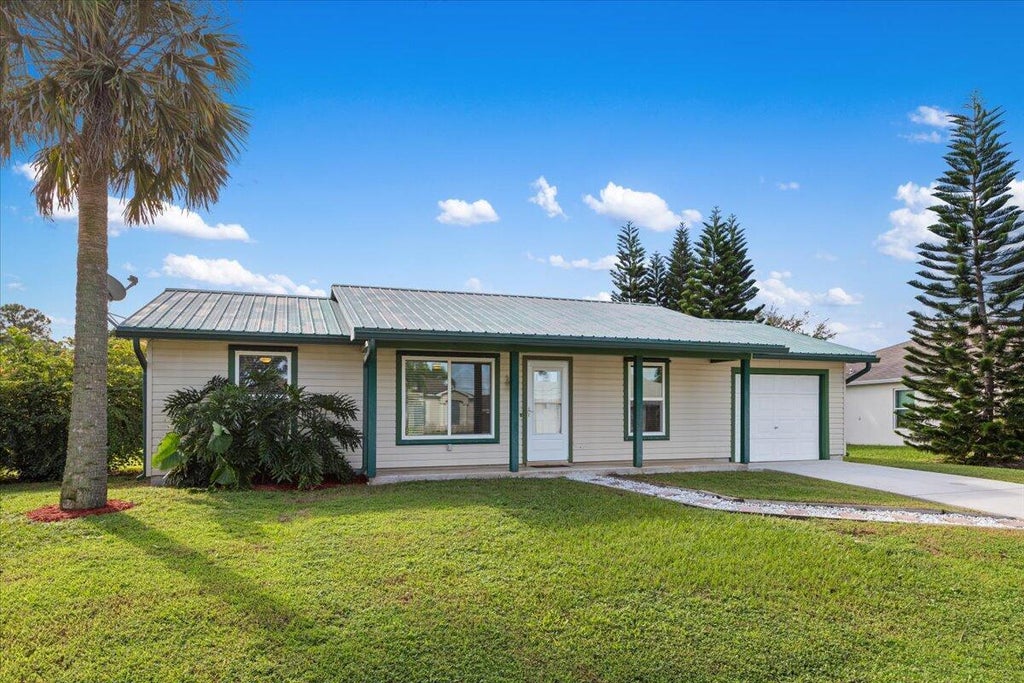 Photo of 814 SW Jennifer Terrace, Port Saint Lucie, FL 34953 (MLS # R11028094)