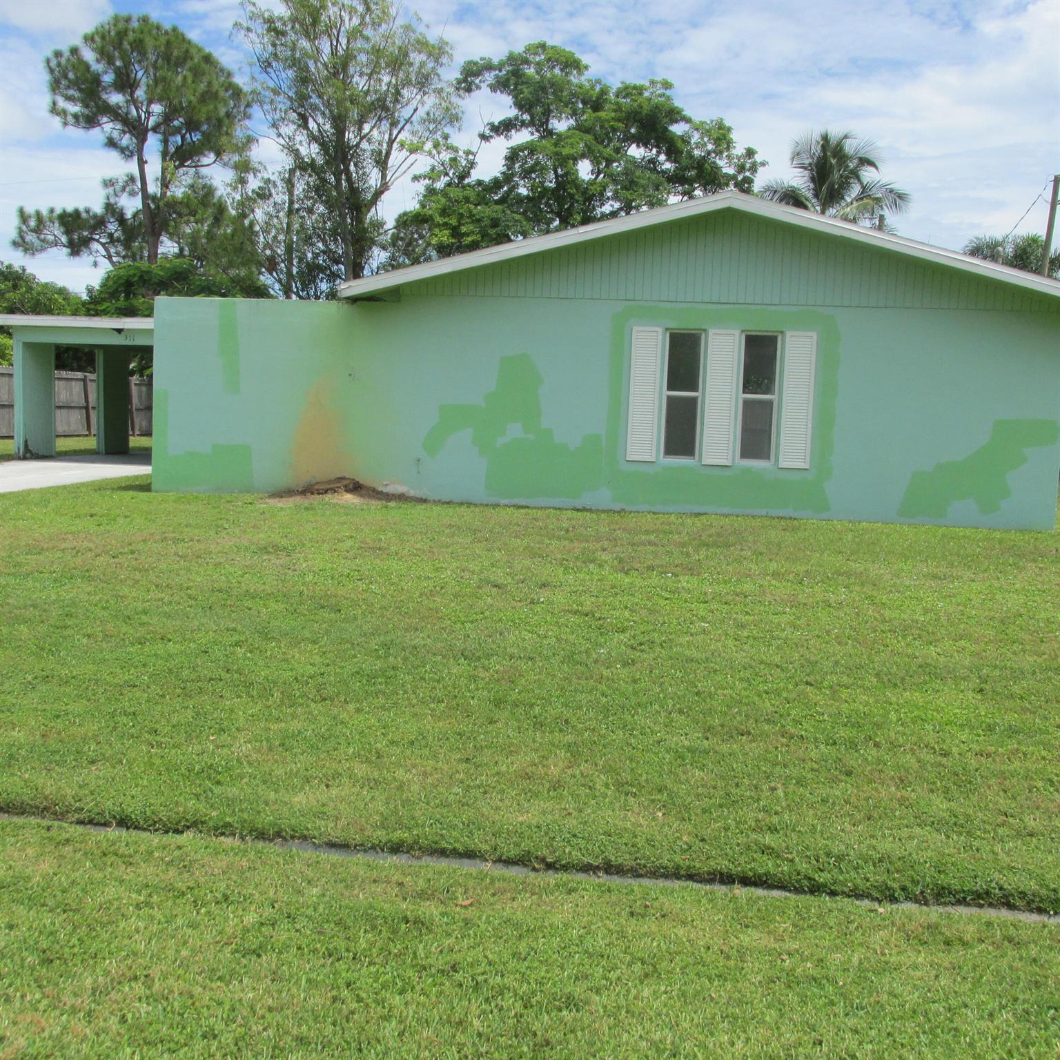 Calling all investors or buyers that want to put sweat equity into bringing this home to 2025. Solid CBS home with tile flooring throughout. home needs updating. AC is 2024, HWH 2023, roof 2005. The carport has an outer utility room with one as washer/dryer area and the other as additional storage. This structure has T-111 exterior that will need remediation in some areas.