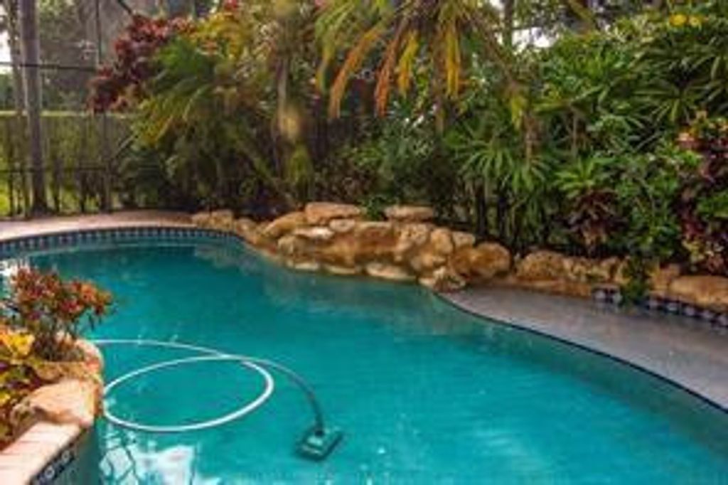 Photo of 9758 Napoli Woods Lane, Delray Beach, FL 33446 (MLS # F10529459)