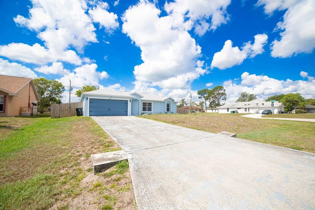 Photo of 486 SW Souris Avenue, Port Saint Lucie, FL 34953 (MLS # R10994048)