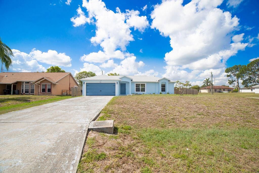 Photo of 486 SW Souris Avenue, Port Saint Lucie, FL 34953 (MLS # R10994048)