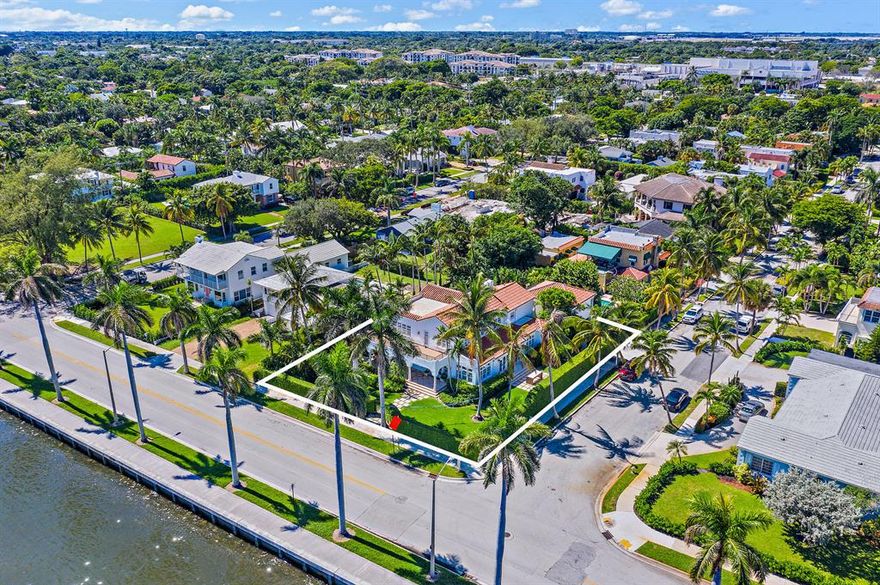 Sumptuous designer living with stunning Palm Beach Waterfront views awaits at this welcoming renovated estate home in West Palm Beach's most prestigious neighborhood, El Cid.  
 
The large, light and bright main house consists of 5 bedrooms with en-suite baths, 2 half baths, an inviting foyer and living room with expansive white pickled pine floors and a fireplace, a dining room with French doors which open to an outdoor dining area, and a large airy family room with pecky cypress ceilings.

The wonderful double size master suite features a fireplace, a sitting room with water views, his/hers walk in closets, dressing hall, a luxurious bath with a separate spa tub and shower, 2 vanities, a water closet with bidet and a door leading to a large private sundeck. All bedrooms have large louvered windows with multi side views that enhance the sensation of breeziness throughout the house.

The huge eat-in island kitchen is complete with a walk-in pantry, a breakfast/dining area, Subzero/Wolf/Jennair appliances, a gas range, commercial double ovens, a butler's pantry with wet bar, a service galley, storage and extra refrigeration and ice maker. 

Additional features include a panoramic office/den with cypress ceilings, a library or exercise room, an elevator, a guest house, and a covered front porch and second floor deck with serene views of the Intracoastal and Palm Beach. 
 
The newer guest house is detached from the main house with a large guest suite consisting of 1 bedroom, 1 bathroom, living area, kitchenette, separate entry, and northeast views of the Intracoastal. The 2 car garage has extra storage, Tesla EV charging station and private half bath with its own entry for outdoor use.
 
Other amenities include whole house impact windows and doors, a whole house generator, high cove ceilings throughout, multiple decks and patios, blue water views from most major rooms, a mudroom laundry room, many original 1926 architectural details and a flowing flexible floor plan. Glass doors throughout the house provide seamless access points to the exterior, maximizing indoor/outdoor living. State of the art custom sound and audiovisual systems (Crestron/Sonos) throughout the house enable seamless home controls, lighting controls, and security system, along with high end designer touches.
 
The lushly landscaped estate lot, set upon almost a third of an acre, is fully hedged and walled for privacy. The entire property is ideal for enjoying the quintessential outdoor lifestyle with a large heated pool (17'x32'), large spa with infinity edge fountain, enclosed outdoor shower, summer kitchen with built in grill, and many areas intended for intimate lounging, al fresco dining and entertaining.  
 
The ultra-convenient location is only minutes from beaches, shopping, world class dining, schools, highways and Palm Beach International Airport. 




DISCLAIMER: Information published or otherwise provided by the listing company and its representatives including but not limited to prices, measurements, square footages, lot sizes, calculations and statistics are deemed reliable but are not guaranteed and are subject to errors, omissions or changes without notice. All such information should be independently verified by any prospective purchaser or seller. Parties should perform their own due diligence to verify such information prior to a sale or listing. Listing company expressly disclaims any warranty or representation regarding such information. Prices published are either list price, sold price, and/or last asking price. The listing company participates in the Multiple Listing Service and IDX. The properties published as listed and sold are not necessarily exclusive to listing company and may be listed or have sold with other members of the Multiple Listing Service. Transactions where listing company represented both buyers and sellers are calculated as two sales. The listing company's marketplace is all of the following: Vero Beach, Town of Orchid, Indian River Shores, Town of Palm Beach, West Palm Beach, Manalapan Beach, Point Manalapan, Hypoluxo Island, Ocean Ridge, Gulf Stream, Delray Beach, Highland Beach, Boca Raton, East Deerfield Beach, Hillsboro Beach, Hillsboro Shores, East Pompano Beach, Lighthouse Point, Sea Ranch Lakes and Fort Lauderdale. Cooperating brokers are advised that in the event of a Buyer default, no commission will be paid to a cooperating Broker on the Deposits retained by the Seller. No commissions are paid to any cooperating broker until title passes or upon actual commencement of a lease. Some affiliations may not be applicable to certain geographic areas. If your property is currently listed with another broker, please disregard any solicitation for services. Copyright 2021 by the listing company. All Rights Reserved.