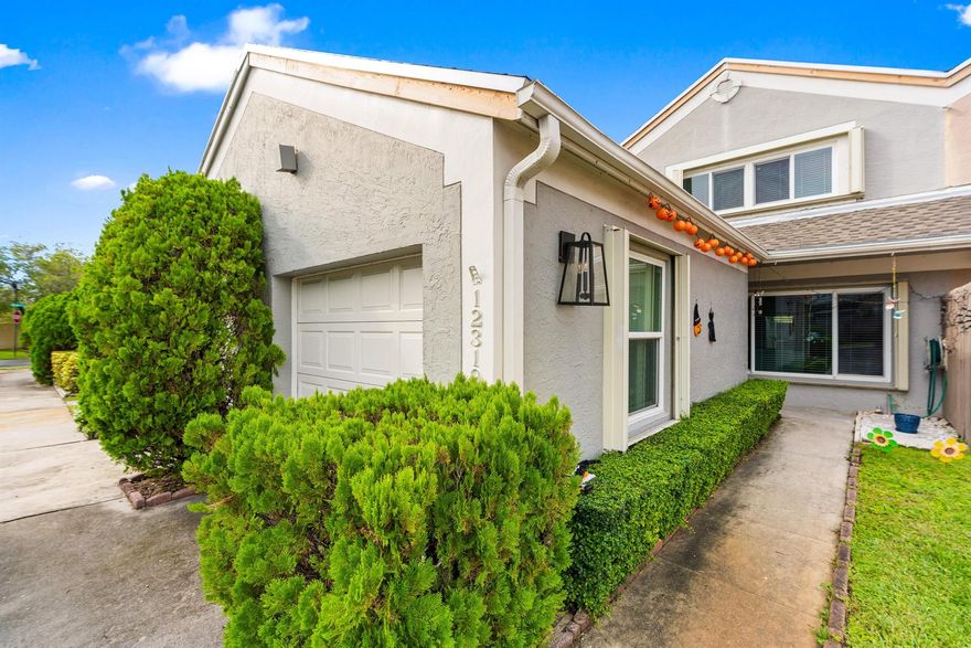 Welcome to this spacious townhome with 4 large bedrooms and 2.5 bathrooms, designed for comfort and modern living. The remodeled kitchen boasts granite countertops, new stainless steel appliances, and ceiling-height cabinetry. Relax or entertain in the screened-in rear patio. Located in a secure, gated community with clubhouse, pool, gym, tennis and pickleball courts. Includes 2 assigned parking spaces plus ample guest parking. Ideally situated near Pembroke Lakes Mall, Pembroke Gardens, Memorial Hospital, C.B. Smith Park, and I-75, this home perfectly blends comfort, lifestyle, and location. Don't miss out!