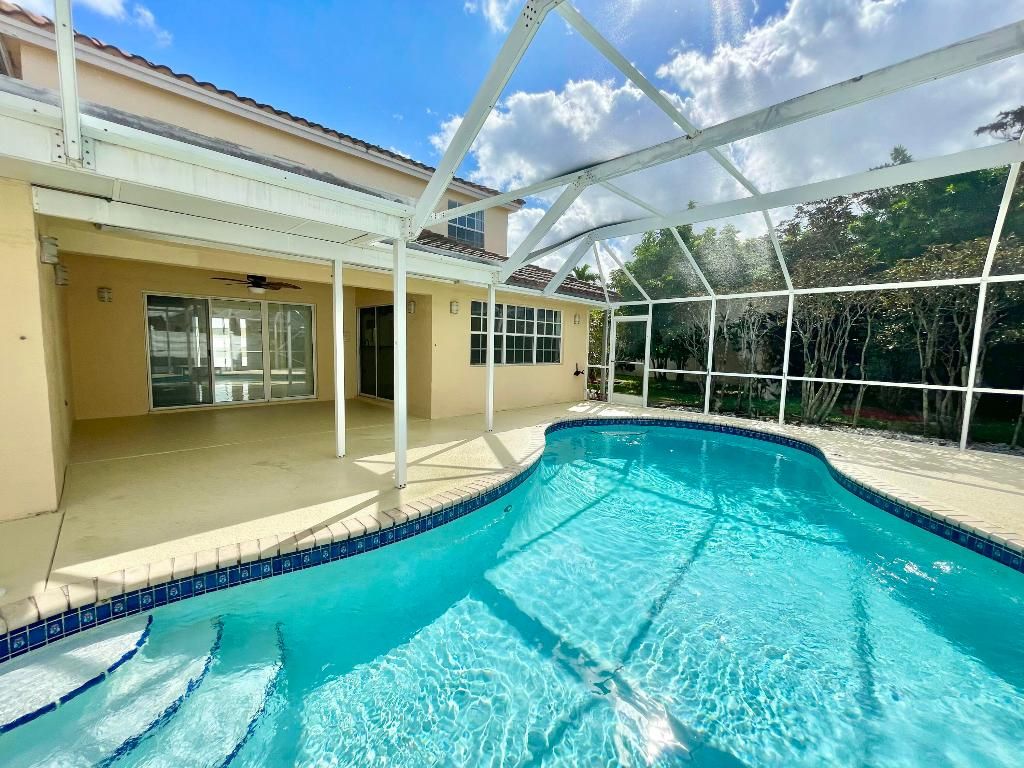 Photo of 10579 Pebble Cove Lane, Boca Raton, FL 33498 (MLS # R11103895)