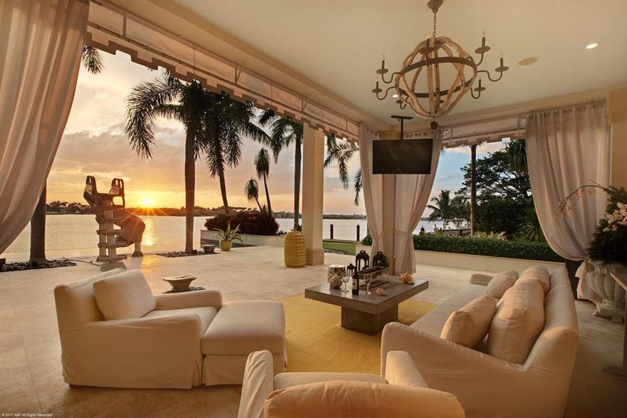 For the discrete homeowner seeking only the best in architectural design, spacious living and the finest in home construction and finishes, this may be the most spectacular estate home on the market. The ''Silver Prism Award'' winning 9,400 SF, 5 bedroom, 8.2 baths double point estate home provides you with 328' of water frontage and 140' of side protected yacht dockage, all within a very private gated compound on McCormick Mile in exclusive Ocean Ridge. Built to commercial specifications with a poured concrete second floor, the home has been impeccably maintained and recently remodeled, the owner is open to offering it furnished or unfurnished.