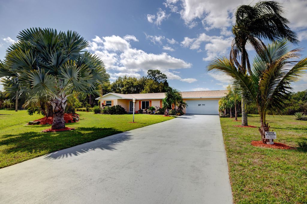 Photo of 303 SE Camino Court, Port Saint Lucie, FL 34952 (MLS # R10786105)