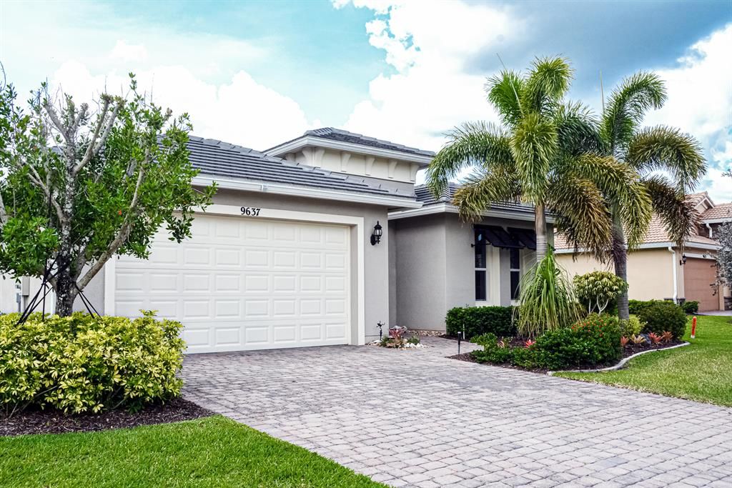Photo of 9637 SW Royal Poinciana Drive, Port Saint Lucie, FL 34987 (MLS # R10726152)