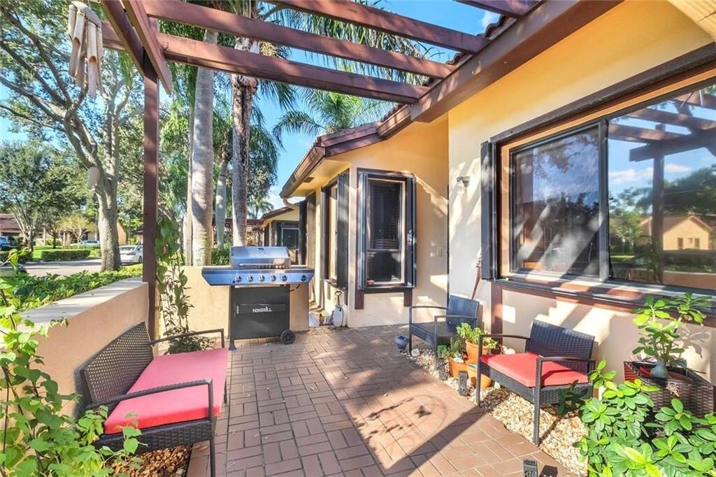 Photo of 7212 PRIMROSE Lane #7212, Tamarac, FL 33321 (MLS # B26058398)