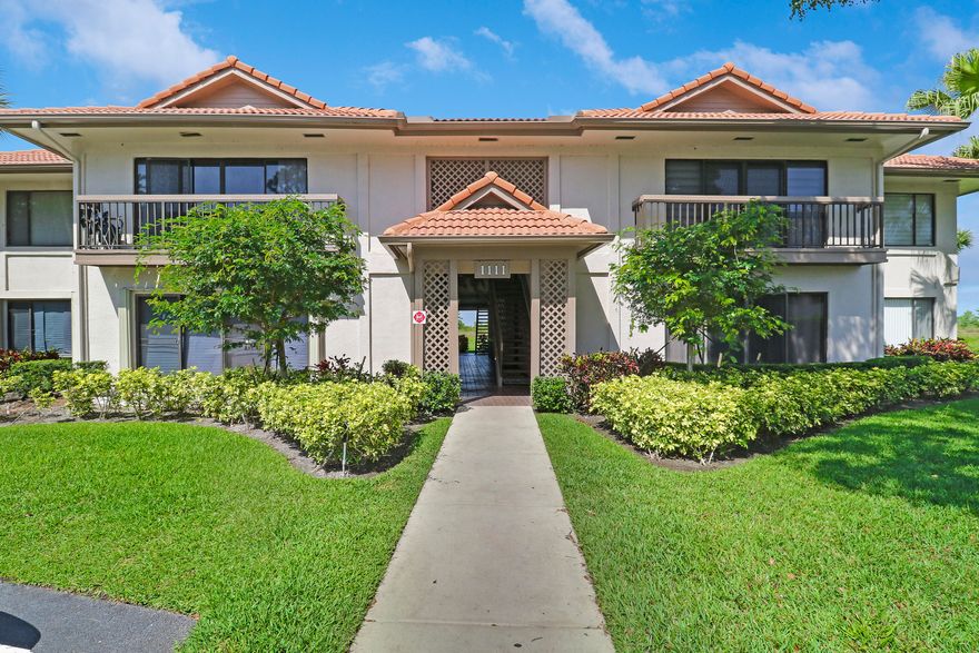 Welcome home to the tranquil community of Dunbar Woods, nestled within the prestigious PGA National Golf Club. Surrounded by manicured lawns and lush landscaping, this charming freshly-painted condo offers a warm and inviting atmosphere. Step inside this spacious first-floor corner unit and enjoy an open-concept layout designed for comfortable living and entertaining. The kitchen, living, and dining areas flow seamlessly together and are complemented by a light-filled den—perfect for a home office, reading nook, or additional lounge space. The kitchen features updated cabinetry, granite countertops, and stainless steel appliances, while all-tile flooring throughout provides both style and easy maintenance. Recent updates include a brand-new A/C (2026),newer refrigerator, and washer.   Within PGA National, residents have access to a swimming pool, a fishing dock, pavilions, walking trails, basketball courts, and a children's playground are within walking distance of Dunbar Woods and close by is the PGA National Park. This wonderful community has entrances on both PGA Blvd. and Northlake Blvd. so whether you are traveling north or south its easy access and close to world-class golf, shopping, dining and Palm Beach International Airport. Schedule a showing today!