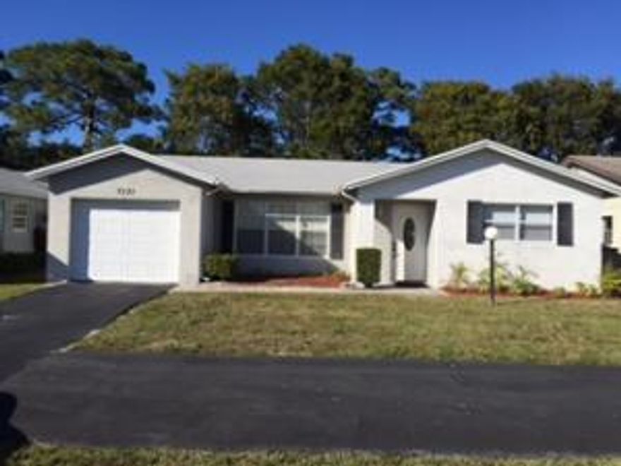 Cute home - move in condition. Very popular community close to the Wellington Mall. Very quiet, tree lined streets. This is not 55+