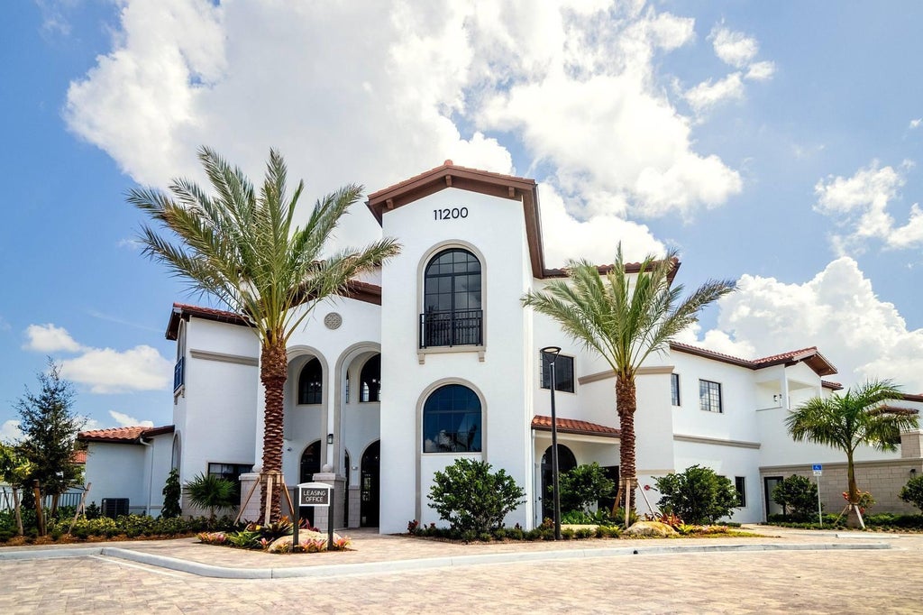 Photo of 11290 Cooper Drive #104, Royal Palm Beach, FL 33414 (MLS # B26078527)