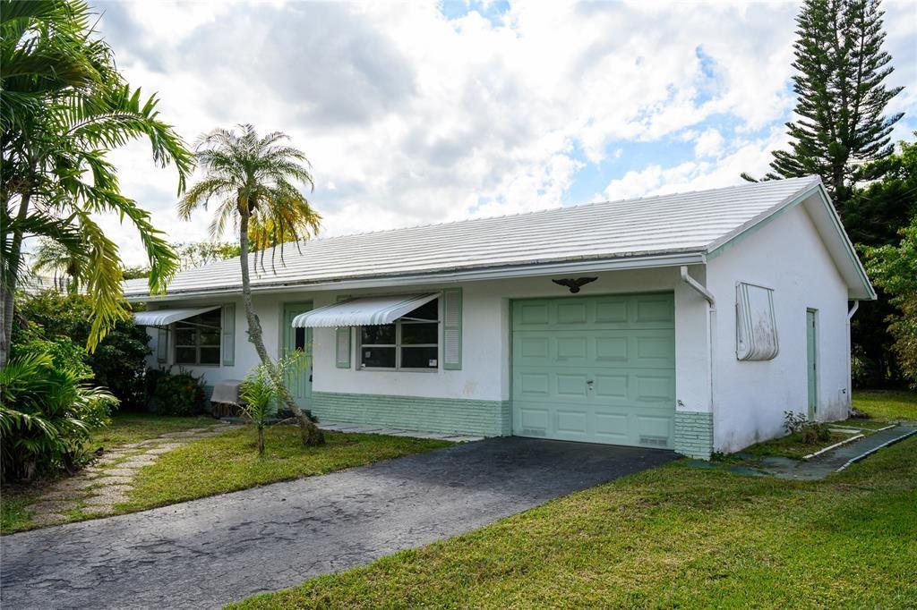 Great opportunity in Westwood 4, a desirable 55+ community! This 2-bedroom, 1-bath home offers endless potential with some TLC. Features include an attached garage, a spacious screened patio, an awning, shutters on the windows, and a large backyard perfect for relaxing or entertaining. Good bones but original everything. Situated on a quiet, dead-end street.