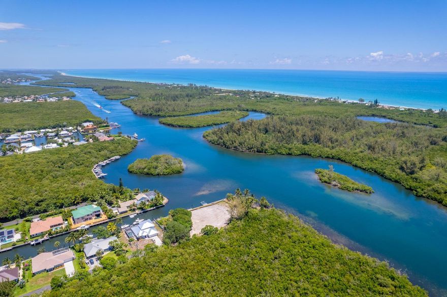 Don't miss this spectacular Point lot on almost 1 acre of land with long and wide views of the Intracoastal overlooking the preserve along Jupiter Island!  Situated at the end of a cul-de-sac less than a half mile to great restaurants and shopping along Bridge Road as well as the beach access on Jupiter Island this property is ideal to build your dream home and/or family compound. With over 424' of waterfrontage, the property can accommodate OVER A 100 FOOT BOAT and/or multiple vessels making it ideal for boaters, fisherman and water enthusiasts alike! The property also offers outstanding privacy at the end of the road with mature oak trees and landscaping as you enter the lot. Very rare find for a 1 acre point lot on the Intracoastal anywhere in south Florida, let alone this superior