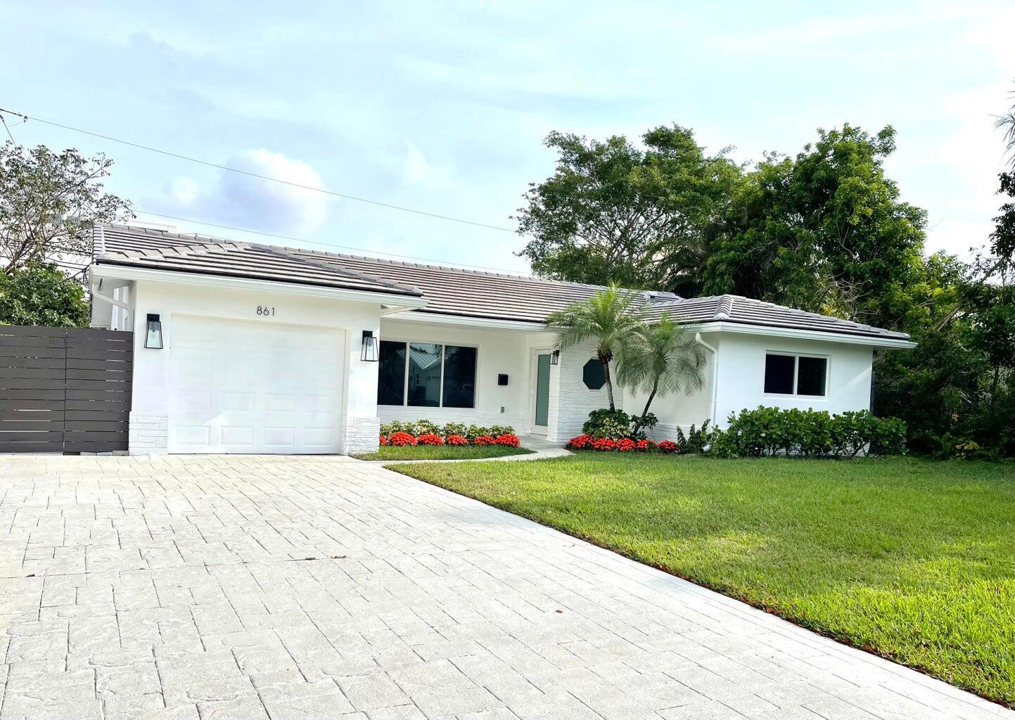 Beautifully Renovated Home in East Boca Raton. Completely renovated with modern finishes throughout. Featuring impact windows and doors, a new 2023 roof, quartz countertops, premium Samsung appliances, and elegant porcelain tile flooring. The wide-open kitchen flows seamlessly into the family room with views of the backyard, perfect for entertaining. Freshly painted inside and out. Oversized driveway provides ample parking. Located in a highly sought-after A-rated school district, on a quiet street yet just minutes from Mizner Park, the beach, and downtown Boca. Local parks are within walking distance. No HOA fees. A great neighborhood offering the very best of Boca living.
