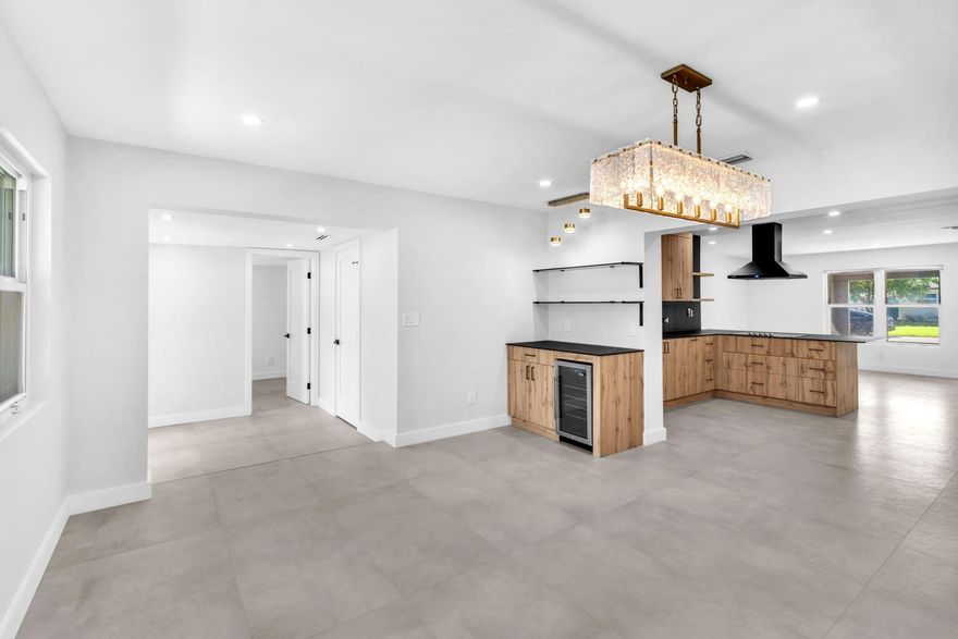 Modern 4-bed, 3-bath home in Dania Beach! Newly renovated with sleek design and open floor plan. Prime location close to houses of worship, beaches, shopping, and the Hard Rock Casino. Luxurious master suite and landscaped yard. A stylish retreat offering convenience and entertainment nearby!