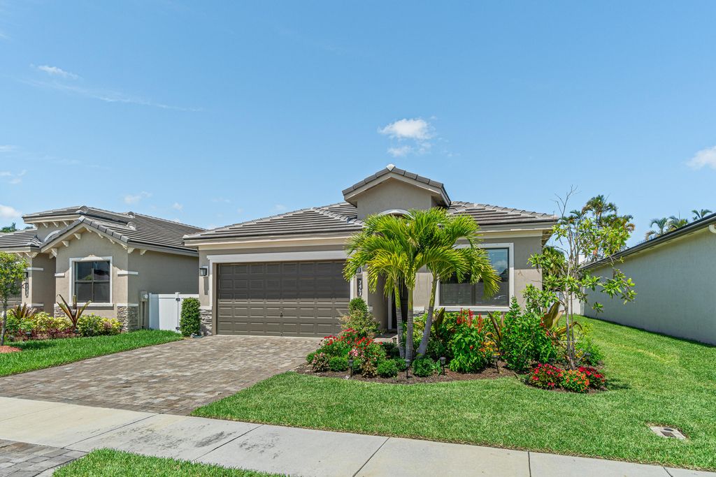 Photo of 7467 Moonrise Drive, Lake Worth, FL 33467 (MLS # R10971209)