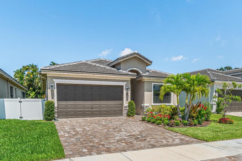 Photo of 7467 Moonrise Drive, Lake Worth, FL 33467 (MLS # R10971209)