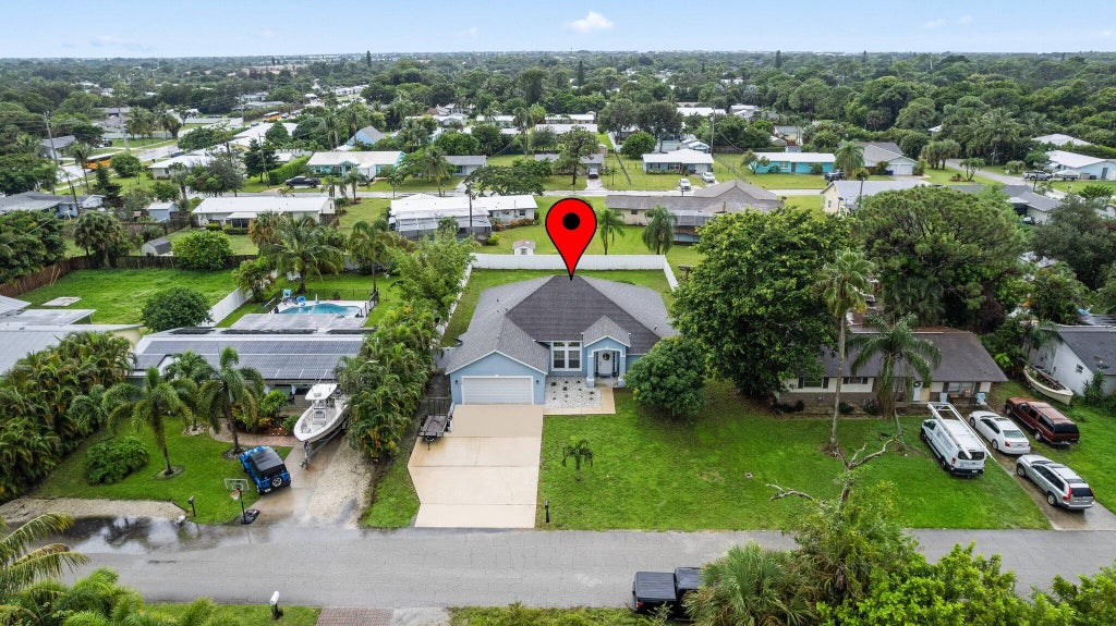Photo of 1126 Terrace Way, Jensen Beach, FL 34957 (MLS # R11024836)