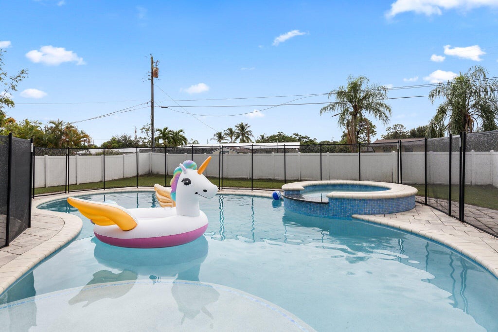Photo of 1126 Terrace Way, Jensen Beach, FL 34957 (MLS # R11024836)